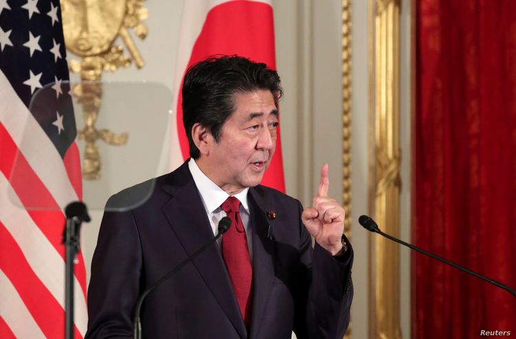Japan PM Abe says in discussions about possible Japan visit by Iranian President Rouhani