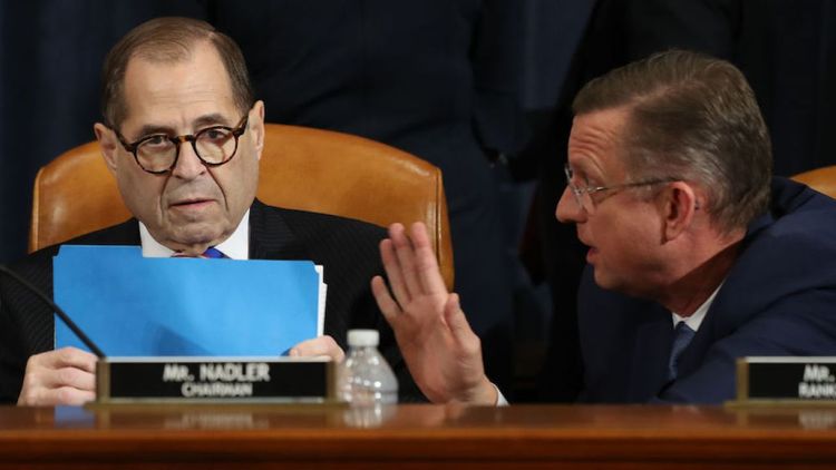 House panel approves Trump impeachment charges