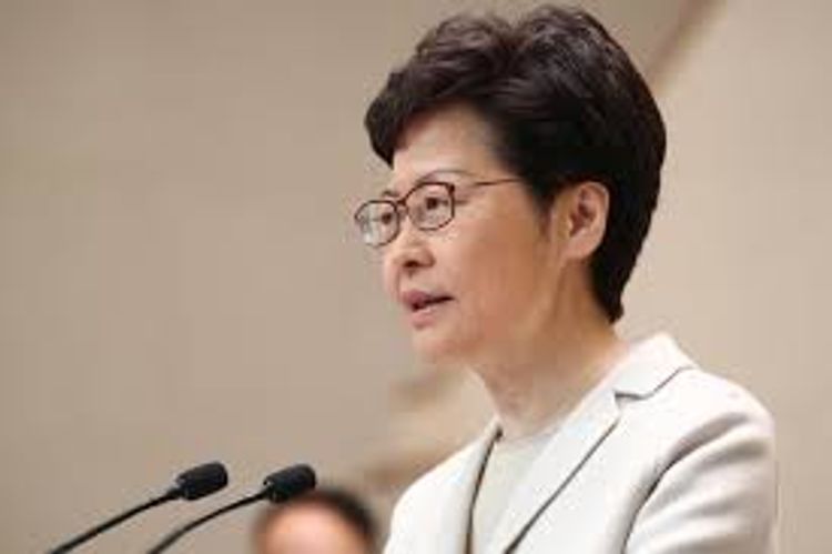 Hong Kong leader Lam heads for Beijing as pressure mounts at home
