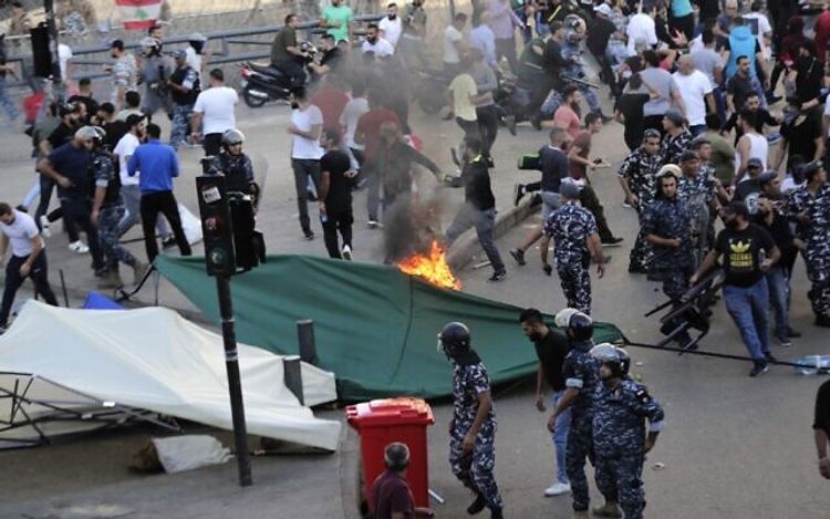 Lebanese troops clash with demonstrators protesting new Hezbollah-backed premier: witnesses