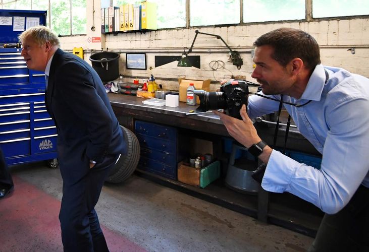 British PM's photographer isolating with coronavirus symptoms