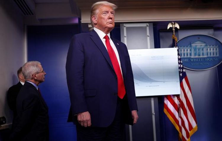 Trump warns Americans of a tough two weeks ahead in coronavirus fight