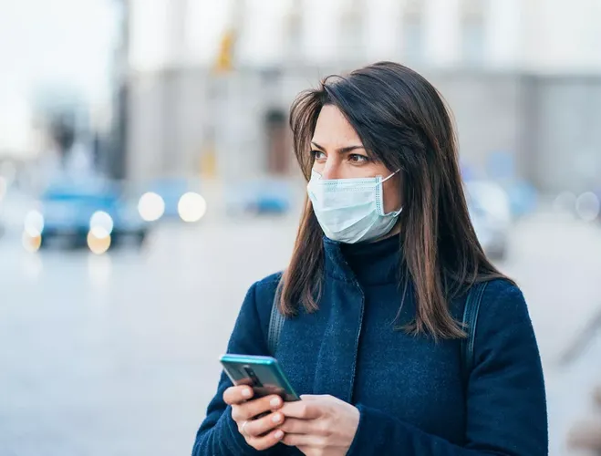 No evidence that masks worn by healthy people affect coronavirus spread - UK official
