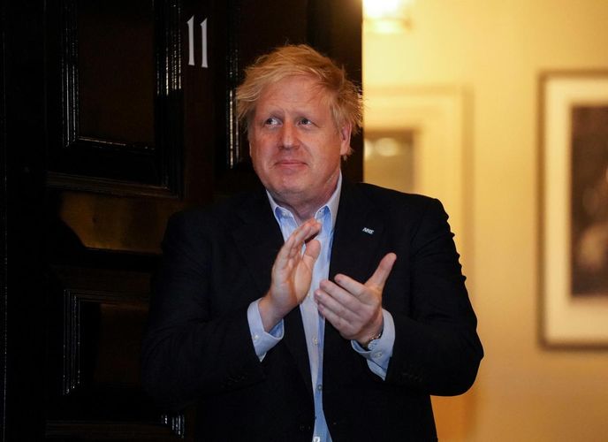 Britain's Johnson invites opposition leaders to work with him over coronavirus emergency