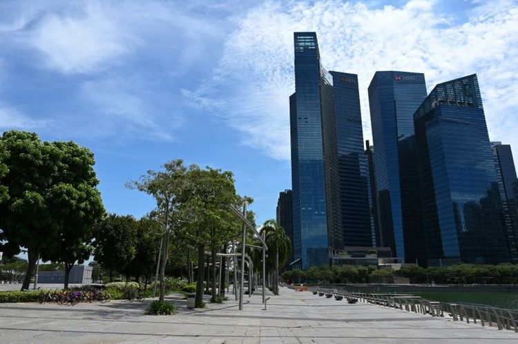 Singapore closes workplaces in virus fight