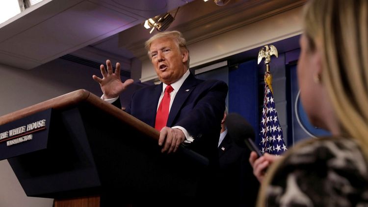 Trump cuts WHO funding over coronavirus, global death toll mounts