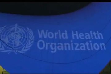 WHO flag videoprojected on building of Heydar Aliyev Center