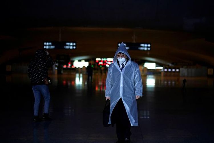 China mandates coronavirus tests for key public workers leaving Wuhan
