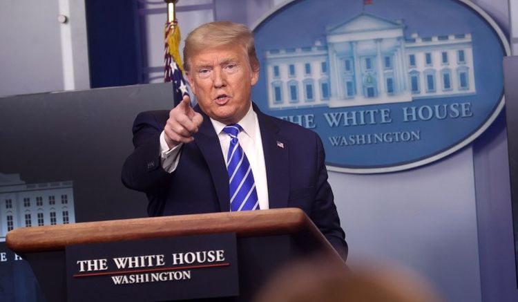 Trump threatens to block aid for U.S. Postal Service if it does not raise prices for Amazon