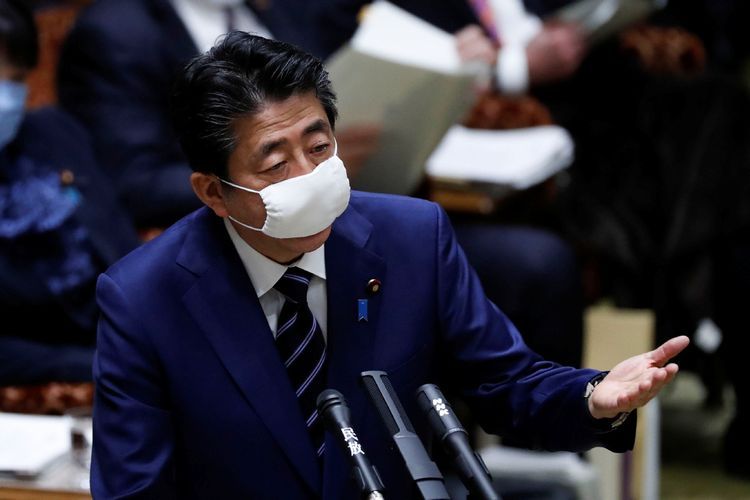 Japan's Abe says impossible to hold Olympics unless pandemic contained