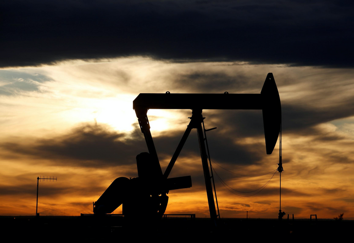 Oil edges lower after jump on U.S. stocks draw