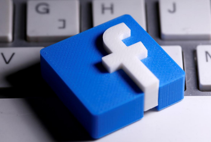 Facebook removes hundreds of QAnon groups, cites risk to public safety
