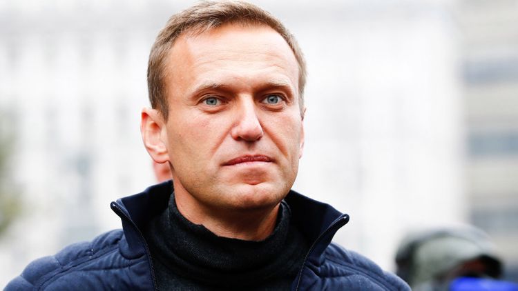 Airport CCTV footage allegedly shows Navalny being handed 'poisonous' drink by his aide