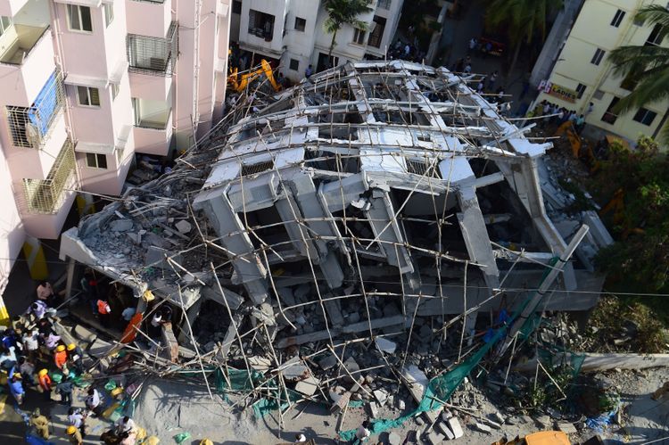 15 injured, around 70 feared trapped after building collapse in India