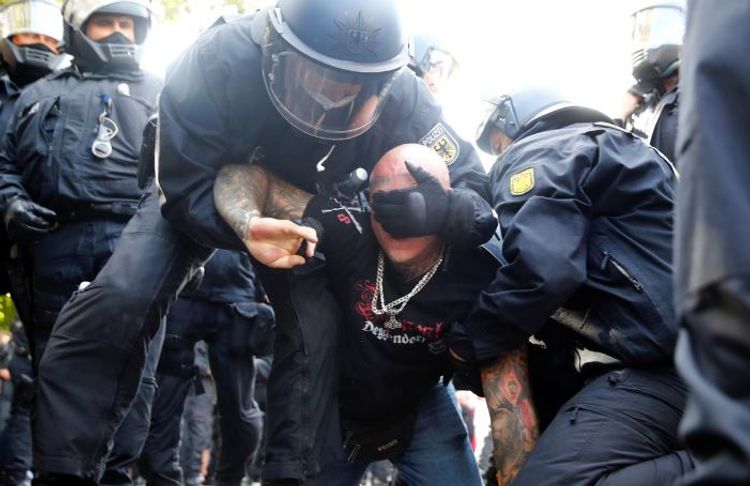 Berlin police disband protest against coronavirus curbs