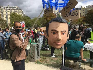 Demonstrators take to streets of Paris in protest against wearing face masks amid COVID-19 