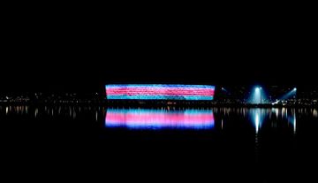 Heydar Aliyev Center, Flame Towers and Baku Olympic Stadium illuminated with Azerbaijani flag  - PHOTO