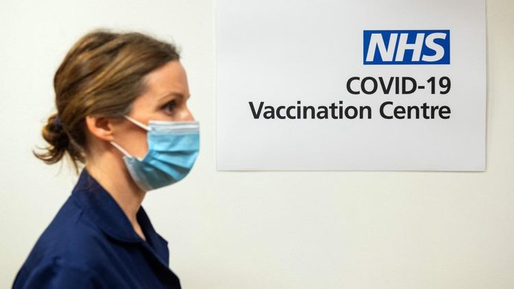 UK rolls out vaccine to public as world watches