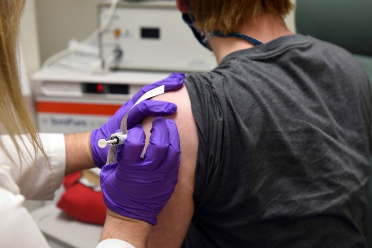 First patient in UK receives Pfizer Covid-19 vaccine