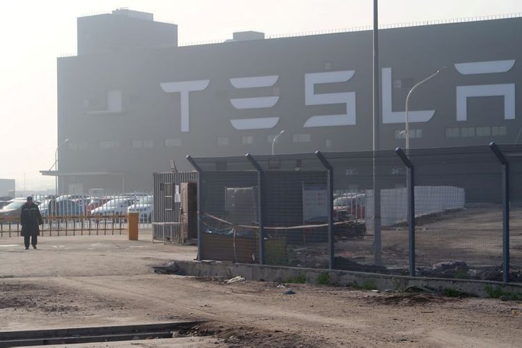 Tesla launches second $5 billion share sale in three months