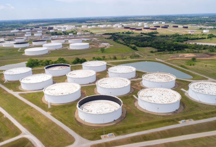 Oil edges lower after jump in U.S. stockpiles, vaccine hopes capping losses