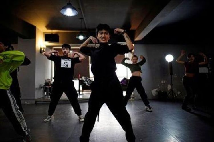 Wuhan's vogue dancers embrace new freedom as COVID-19 anniversary nears