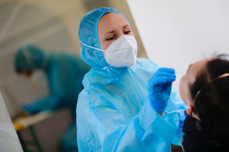 Germany’s confirmed coronavirus cases rise by 14,455
