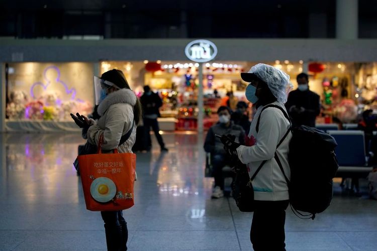 China sees fall in coronavirus deaths but WHO urges caution