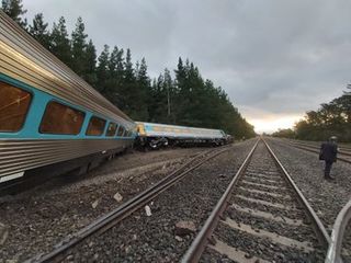 Two dead, several injured as train derails and overturns in Australia