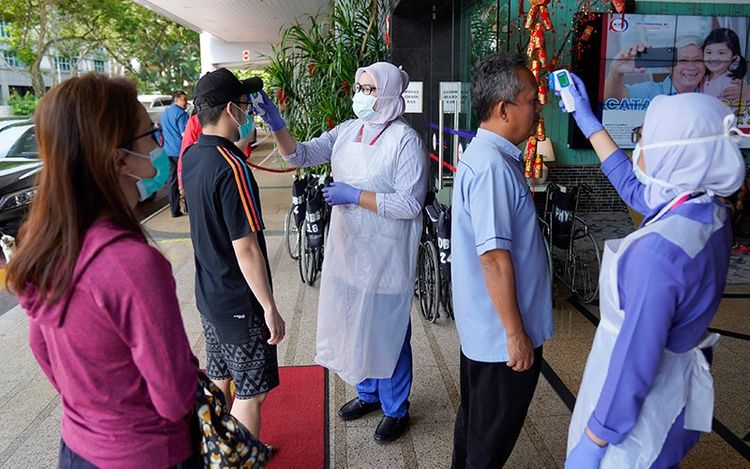 Malaysia says American coronavirus case now tests negative for virus