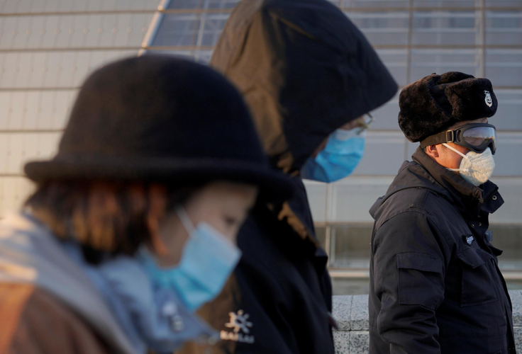 China reports 648 new cases of coronavirus, but infections outside Hubei falling