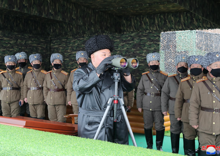 North Korea's Kim guides military drills, warns 'serious consequences' if virus breaks out