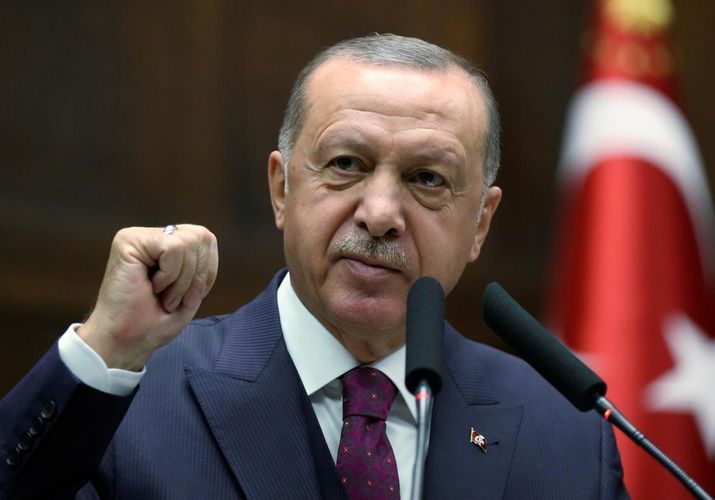 Erdogan vows to keep doors open for refugees heading to Europe