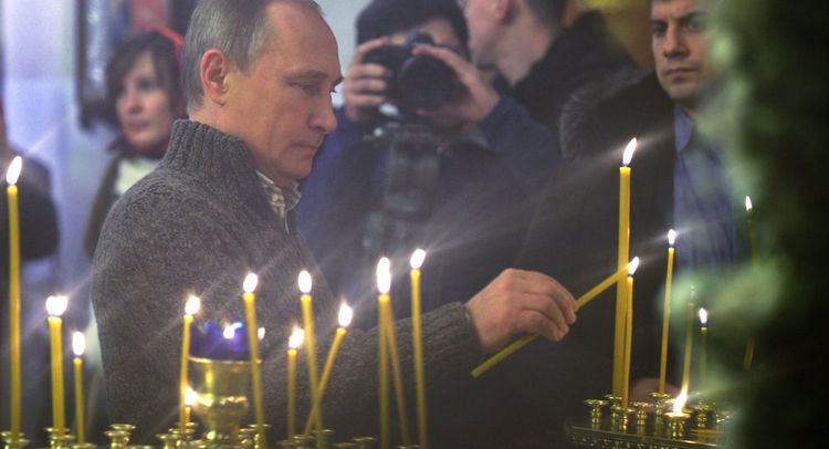 Russian President Putin attends Christmas service at Transfiguration Cathedral in St. Petersburg