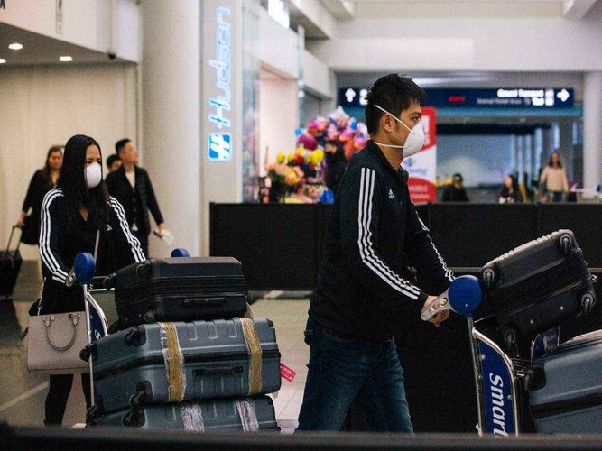 China locks down more cities, restricting 56 million people