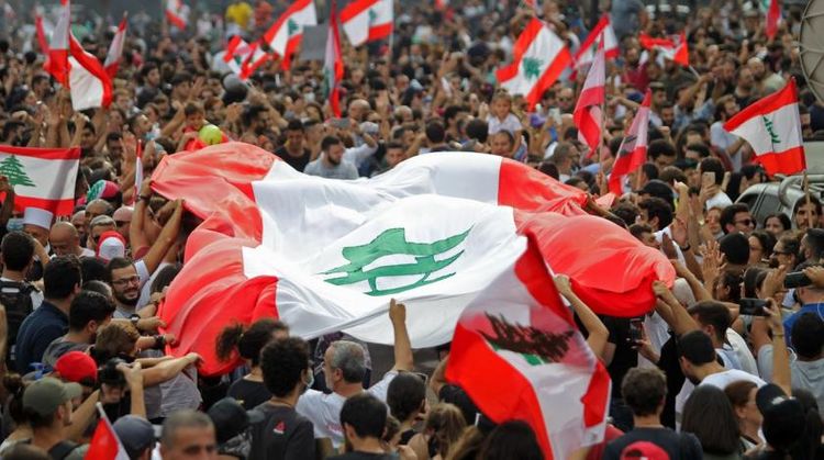 Lebanese security fire water cannons at protesters
