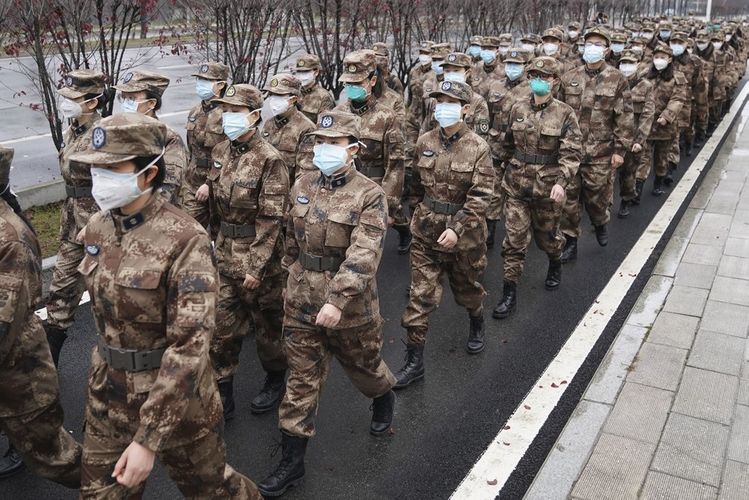 China extends holiday to contain virus as death toll rises