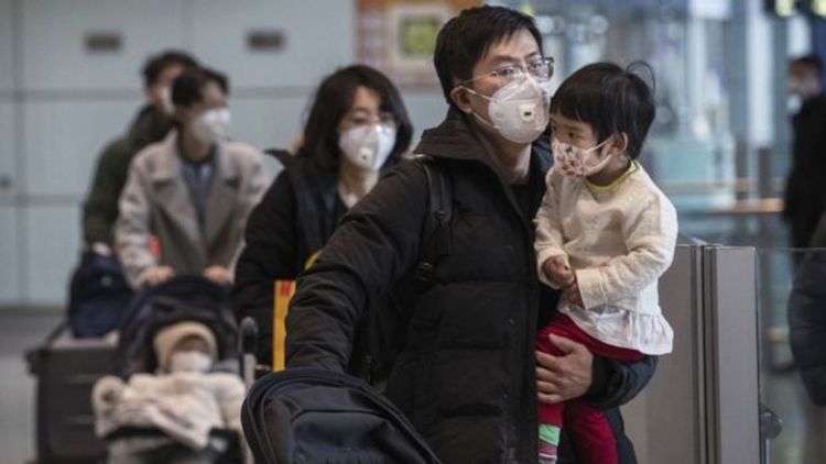 China says death toll hits 213, confirmed cases rise to 9,692