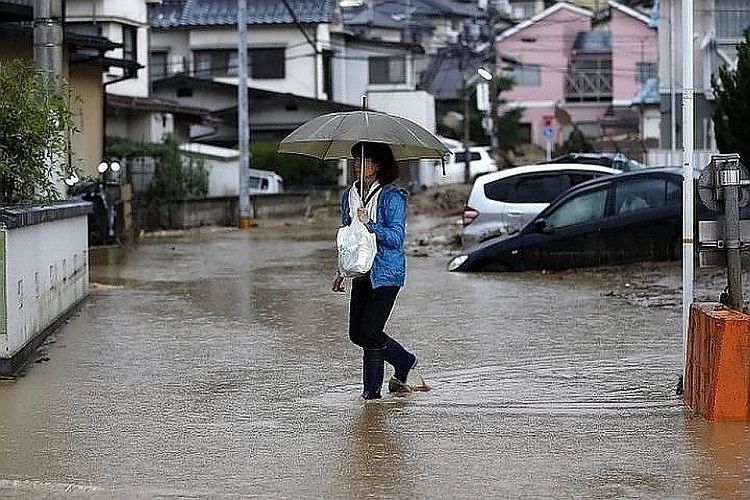 Heavy rains lash Japan's Kyushu, triggering evacuations and leaving at least 13 missing