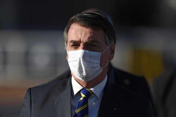 Brazilian president says he has coronavirus symptoms
