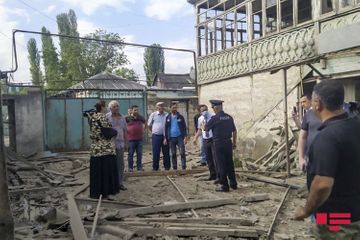 Projectiles, thrown by Armenians fall to residential houses and yards in Dondar Gushchu village of Tovuz