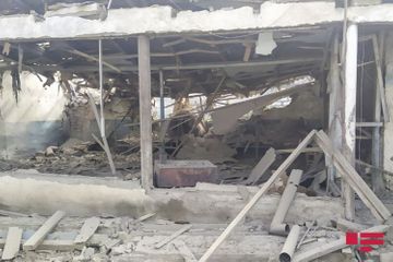 Projectiles, thrown by Armenians fall to residential houses and yards in Dondar Gushchu village of Tovuz