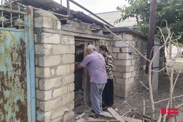 Projectiles, thrown by Armenians fall to residential houses and yards in Dondar Gushchu village of Tovuz