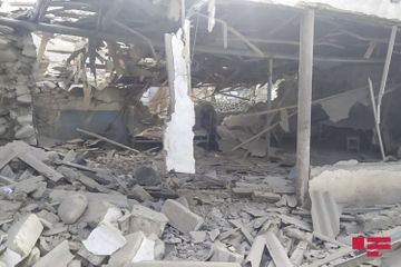 Projectiles, thrown by Armenians fall to residential houses and yards in Dondar Gushchu village of Tovuz