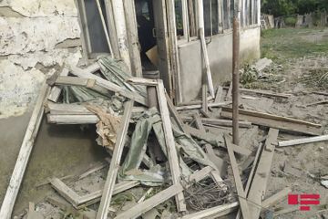 Projectiles, thrown by Armenians fall to residential houses and yards in Dondar Gushchu village of Tovuz