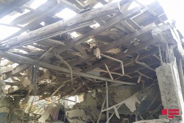 Projectiles, thrown by Armenians fall to residential houses and yards in Dondar Gushchu village of Tovuz
