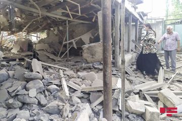 Projectiles, thrown by Armenians fall to residential houses and yards in Dondar Gushchu village of Tovuz