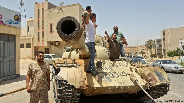 France, Germany, Italy threaten sanctions over arms for Libya