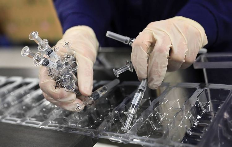 Four COVID-19 vaccines proven to be safe, Russian PM says