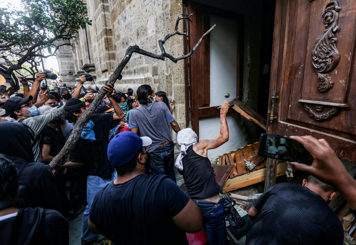 Protests over police abuses spread to Mexico City, stones thrown at U.S. embassy